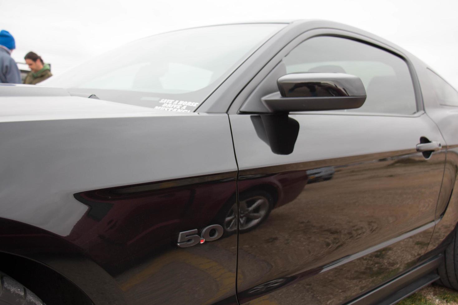 Cars on the race track and on the roads of the desert photo