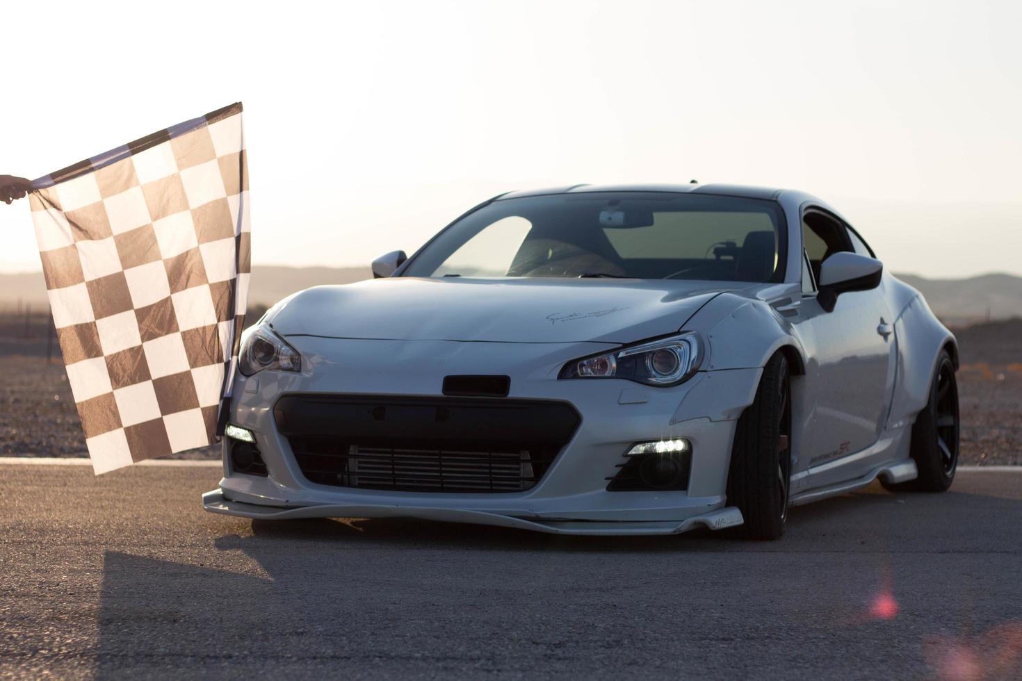 Cars on the race track and on the roads of the desert photo