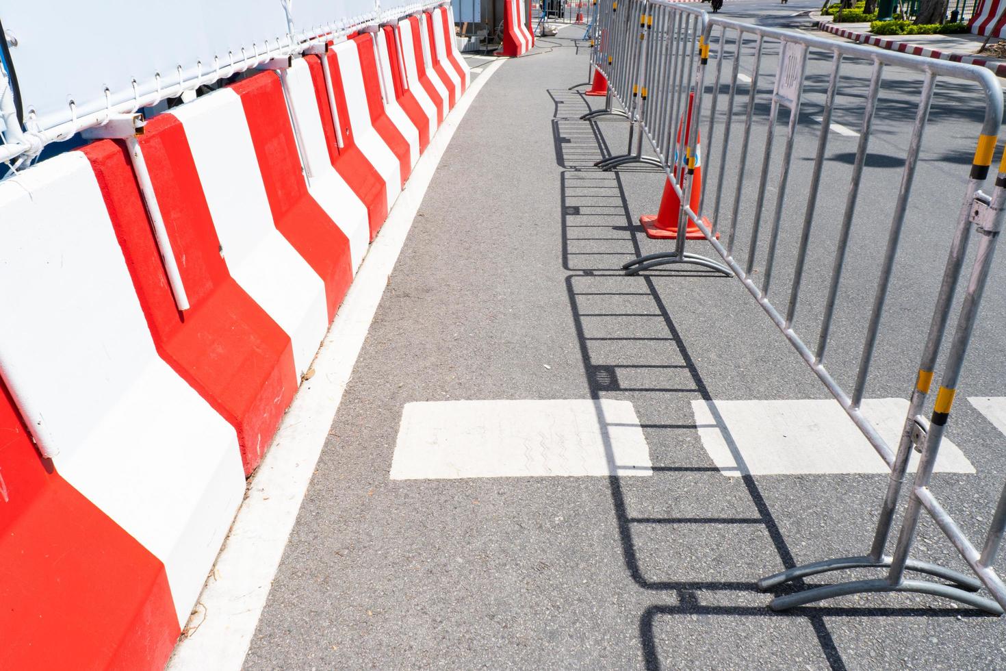 Road is closed with fence because of construction photo