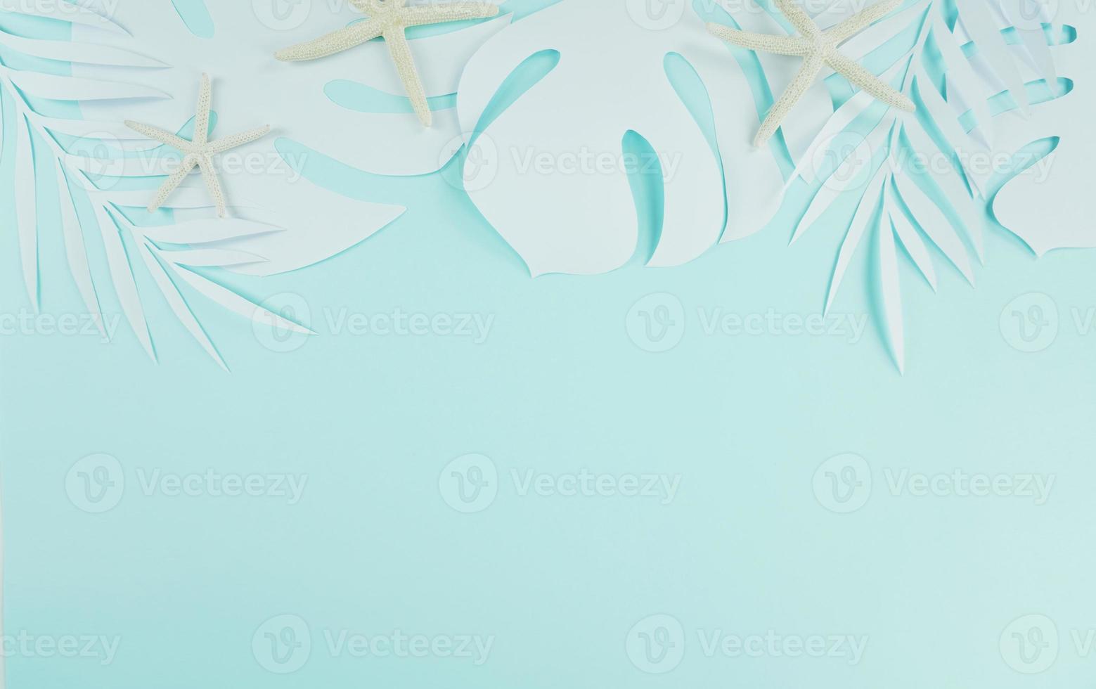 Paper cutting palm leaves, paper concept of tropical summer photo