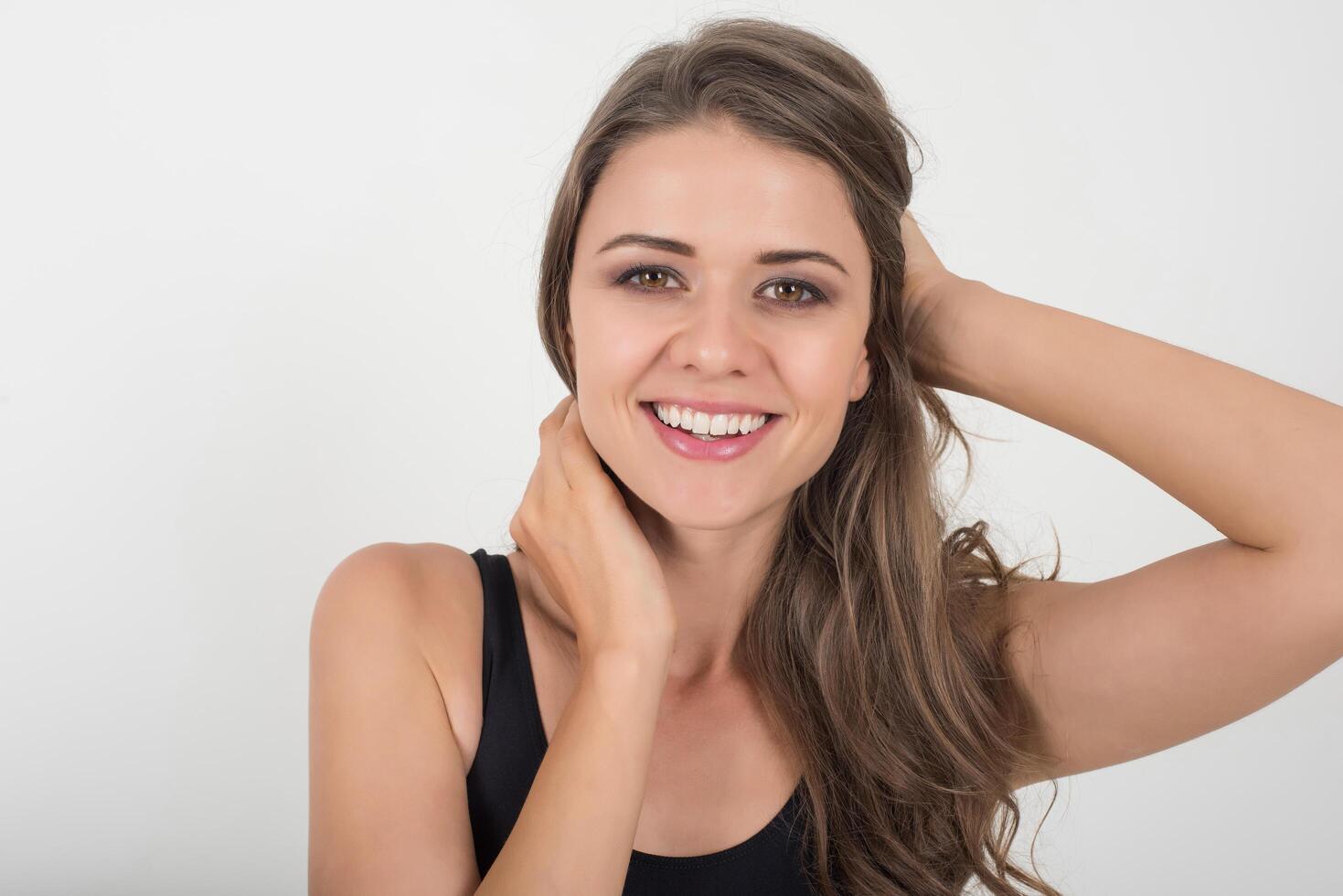 Beautiful woman with healthy body on white background photo