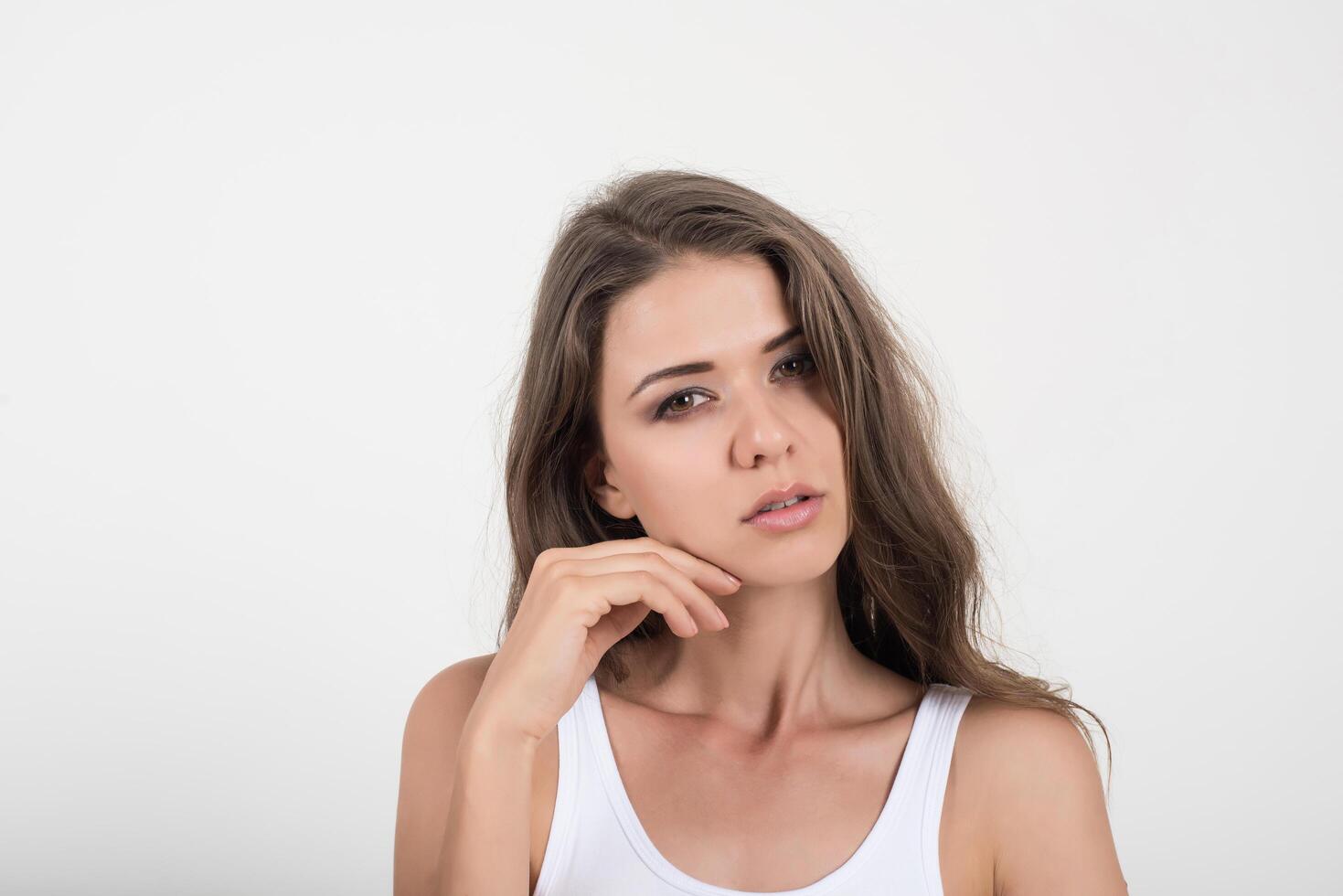 Beautiful woman with healthy body on white background photo