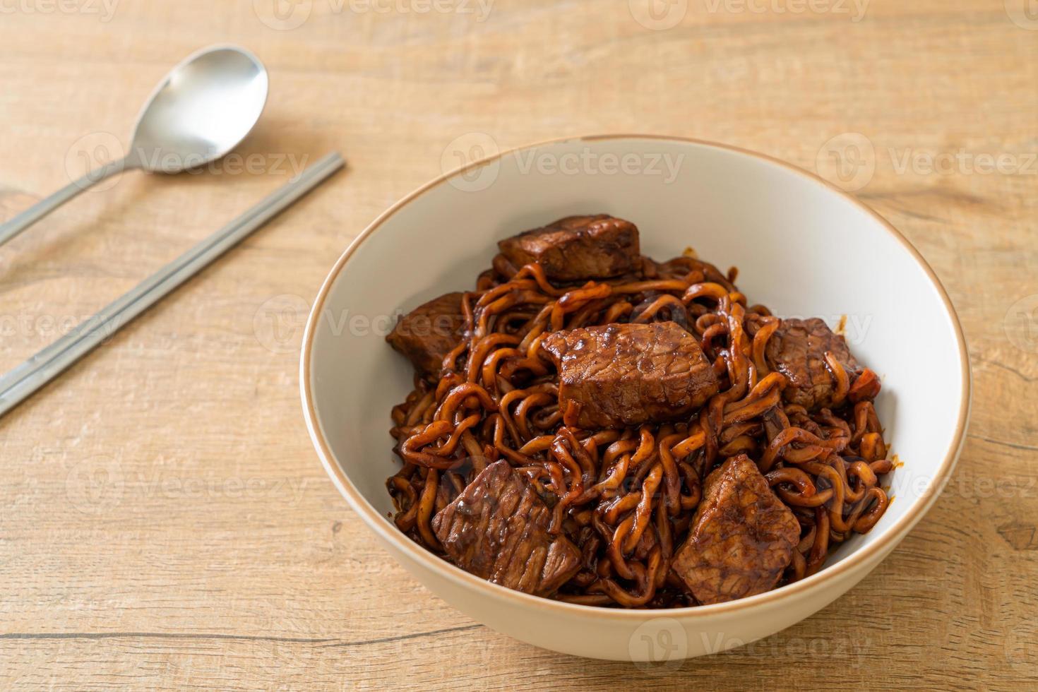 Jjapaguri or Chapaguri, Korean Black Beans Spicy Noodles with Beef photo