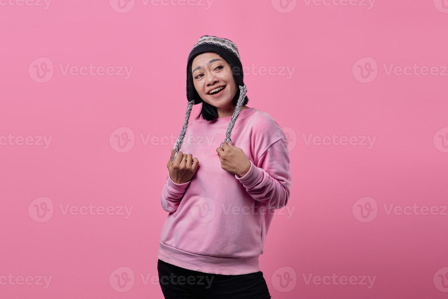 Woman smiling broadly looking at empty space photo