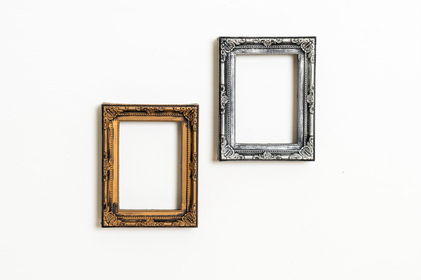 Empty picture frame on white wall background with copy space photo