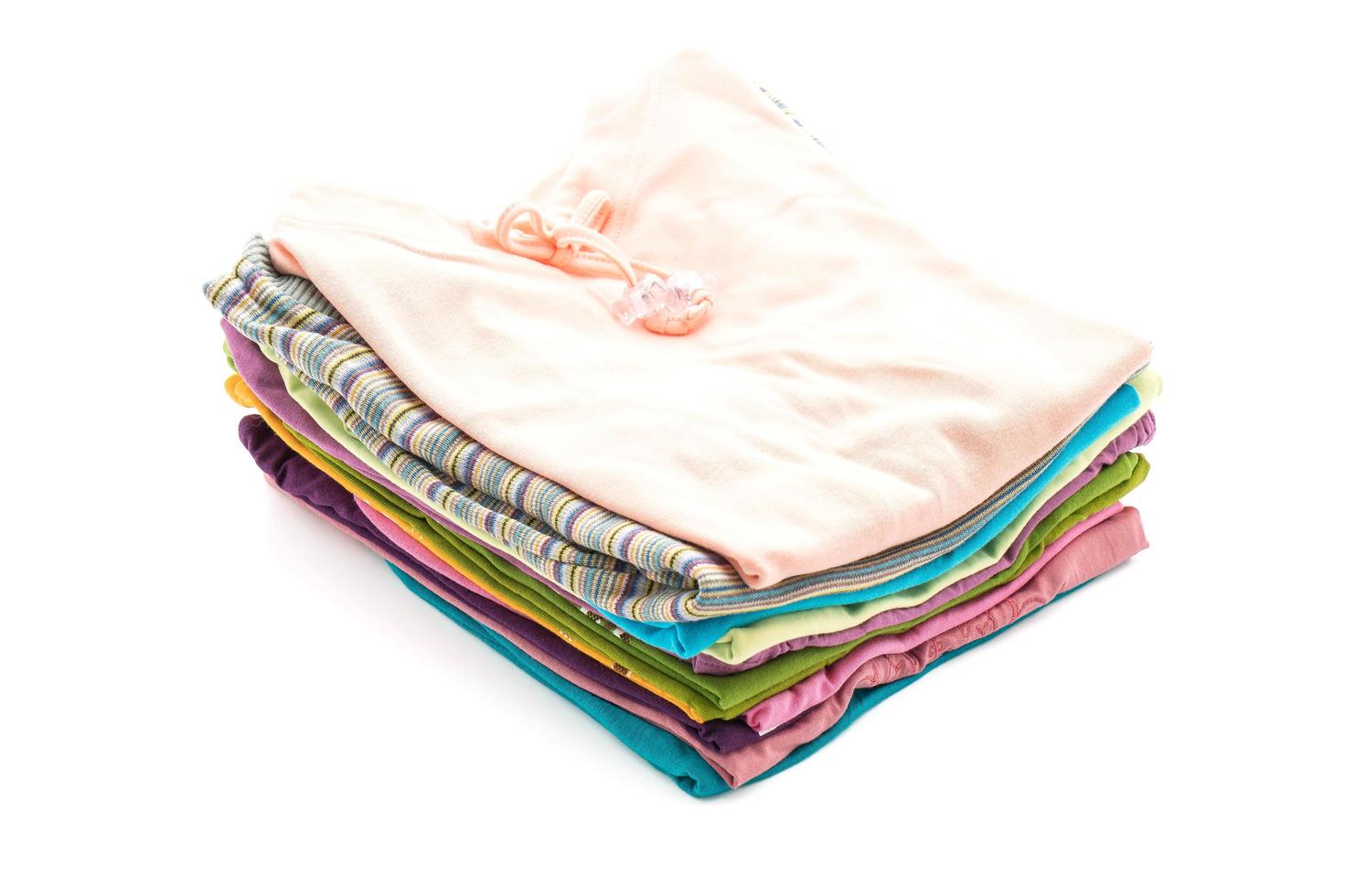 Stacks of clothing on white background 3189181 Stock Photo at Vecteezy