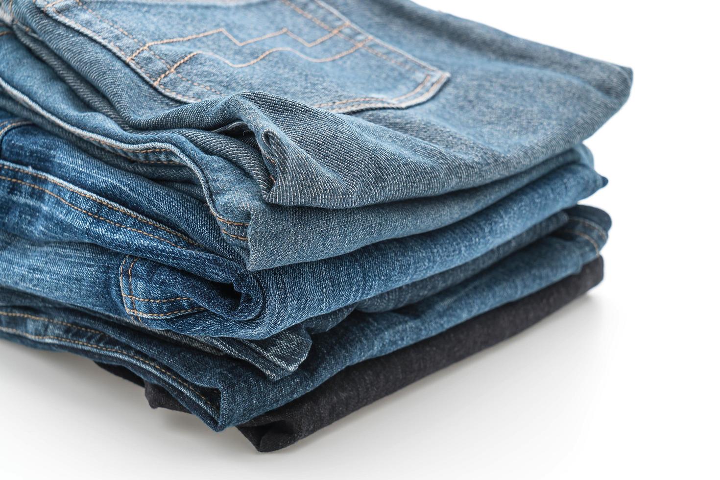 Stacks of clothing on white background photo