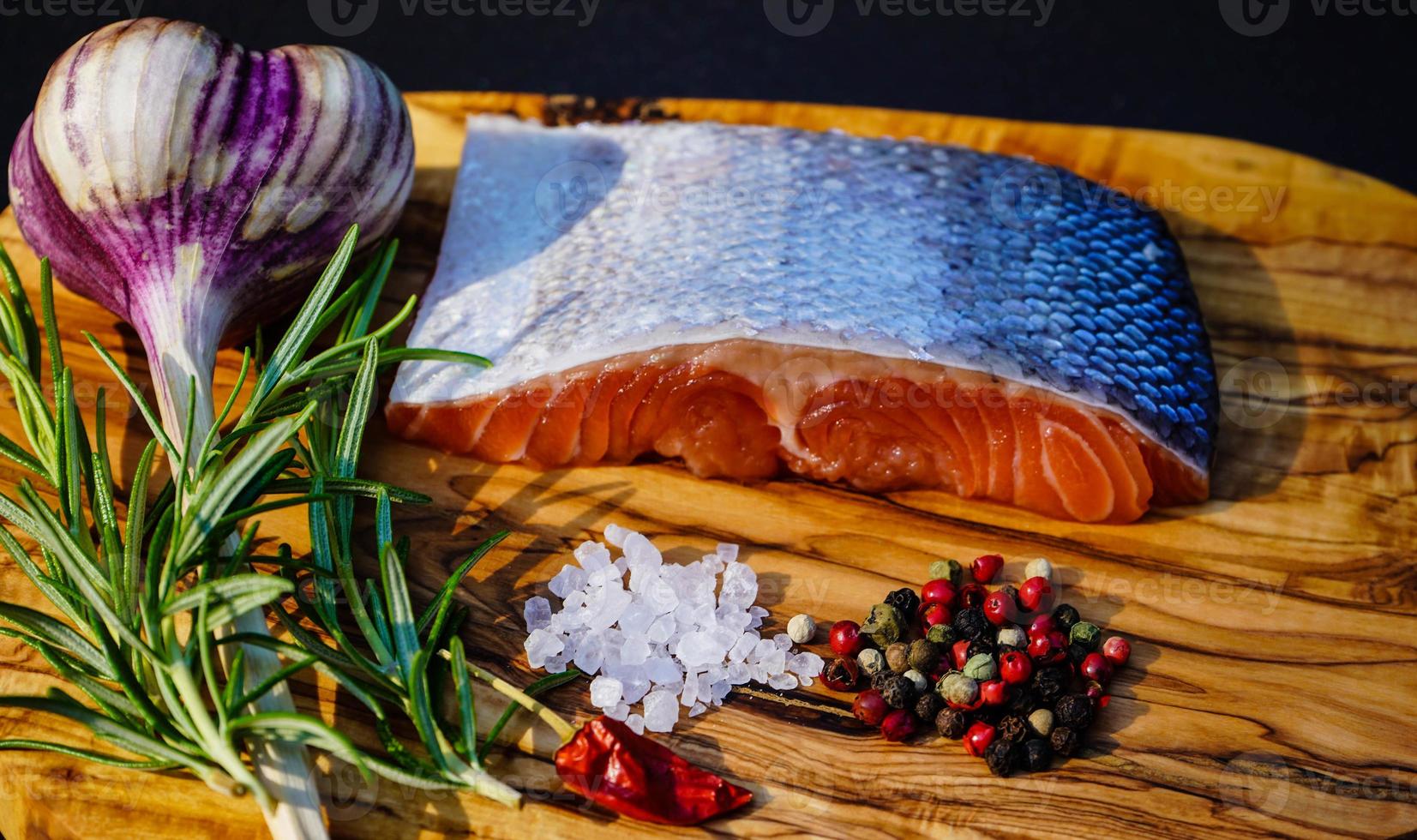 Fresh salmon trout fillet with herbs  spices and salad for bbq photo