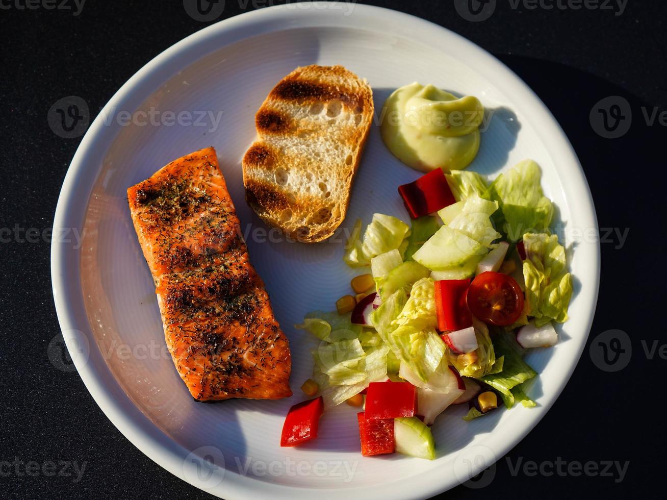 Fresh salmon trout fillet with herbs  spices and salad for bbq photo