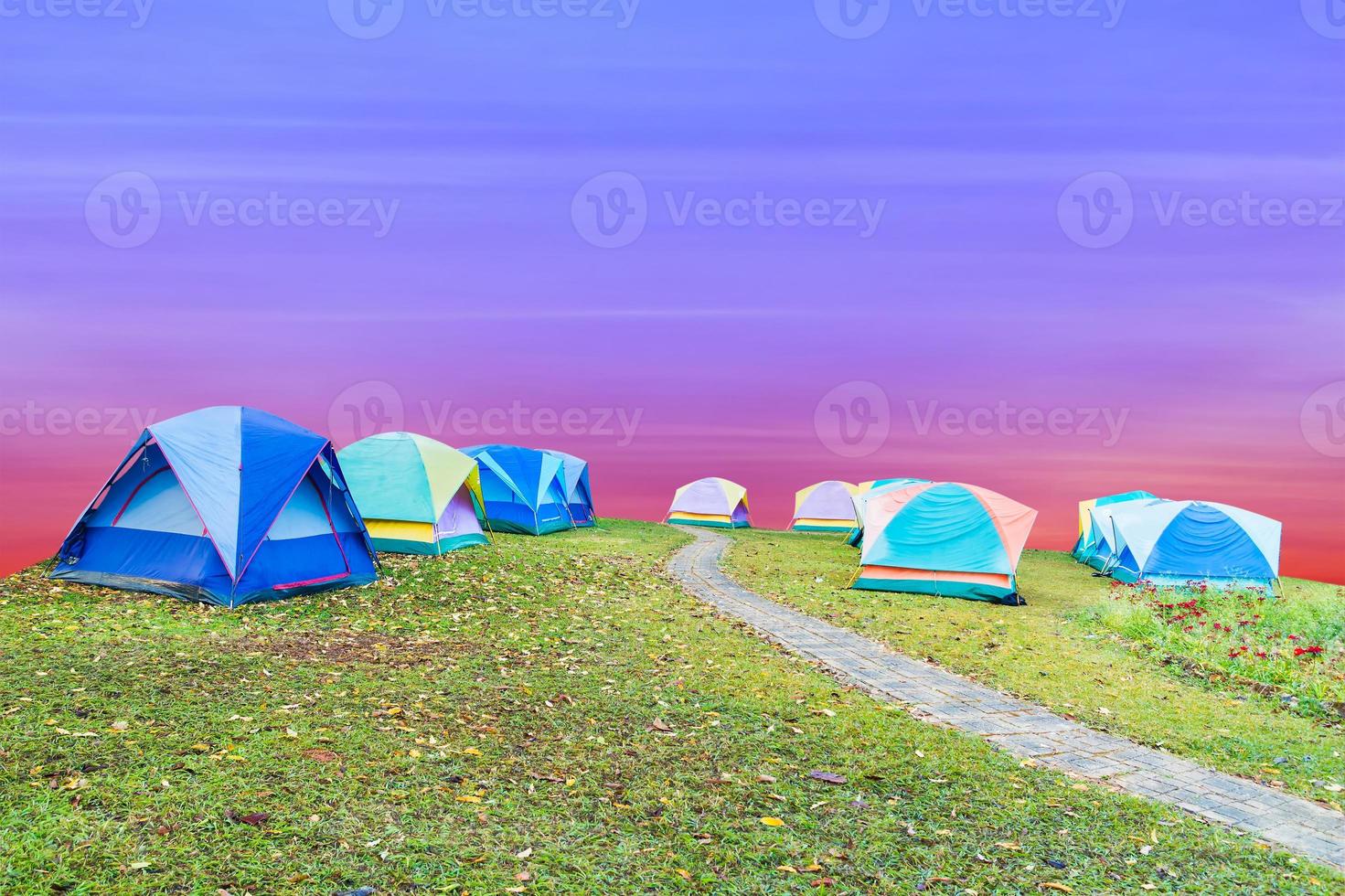 tourist tent with beautiful sunset background photo