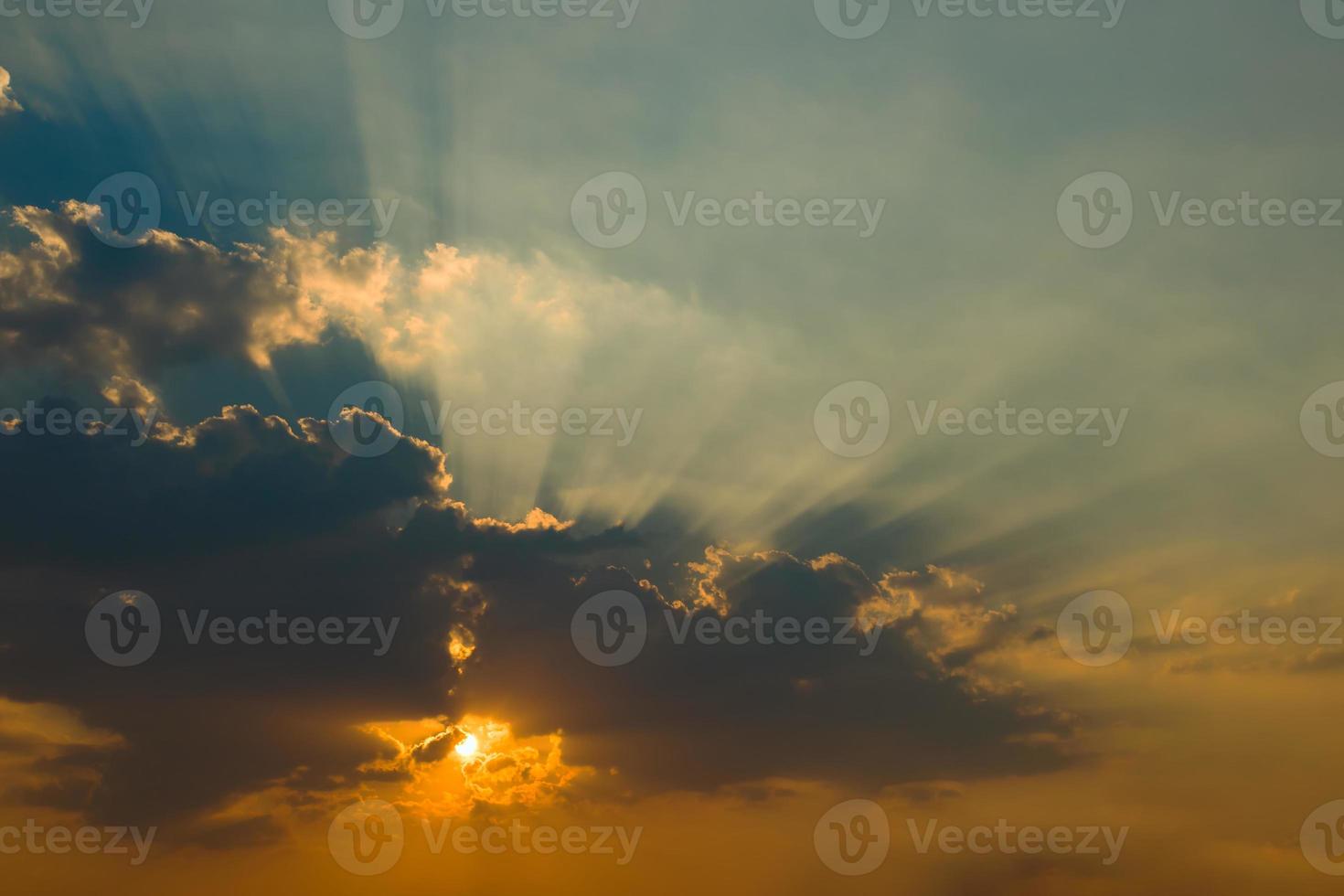 Beautiful sky with clouds and sun rays photo