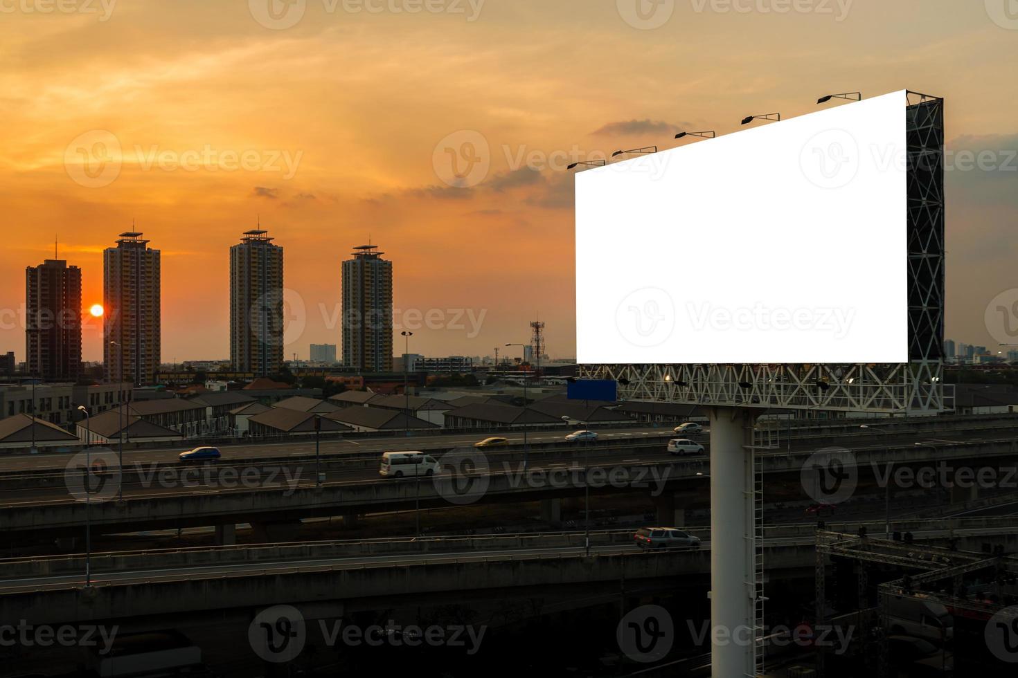 blank billboard beside express way at beautyful sunset photo