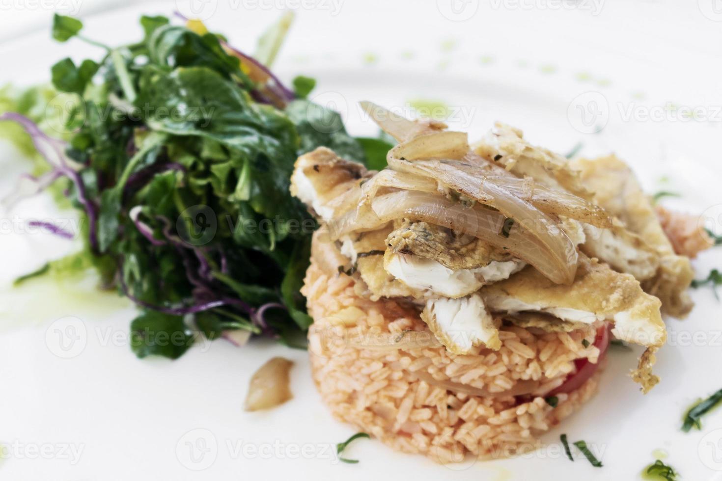 Portuguese fish in Escabeche sauce with tomato rice gourmet meal photo