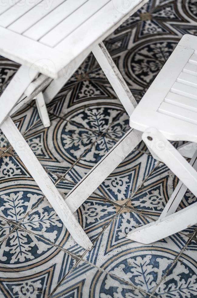 Traditional design old rustic floor tiles detail in Seville Andalucia cafe photo