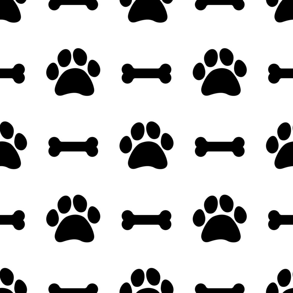 Seamless pattern with bones and paw prints of animals vector