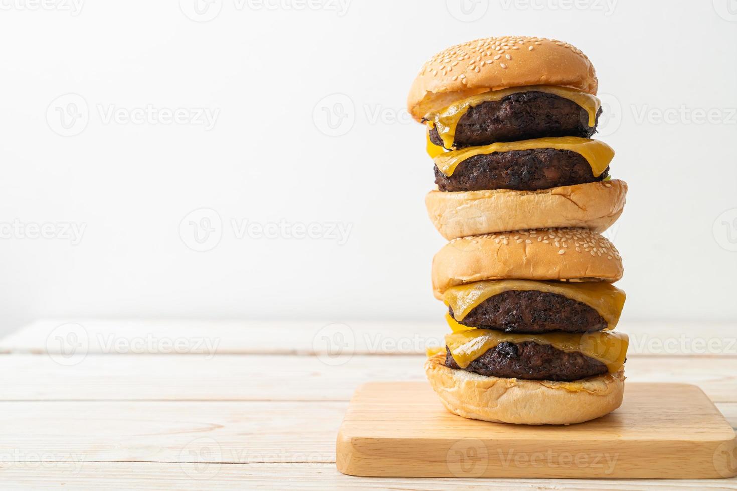 Hamburger or beef burgers with cheese - unhealthy food style photo