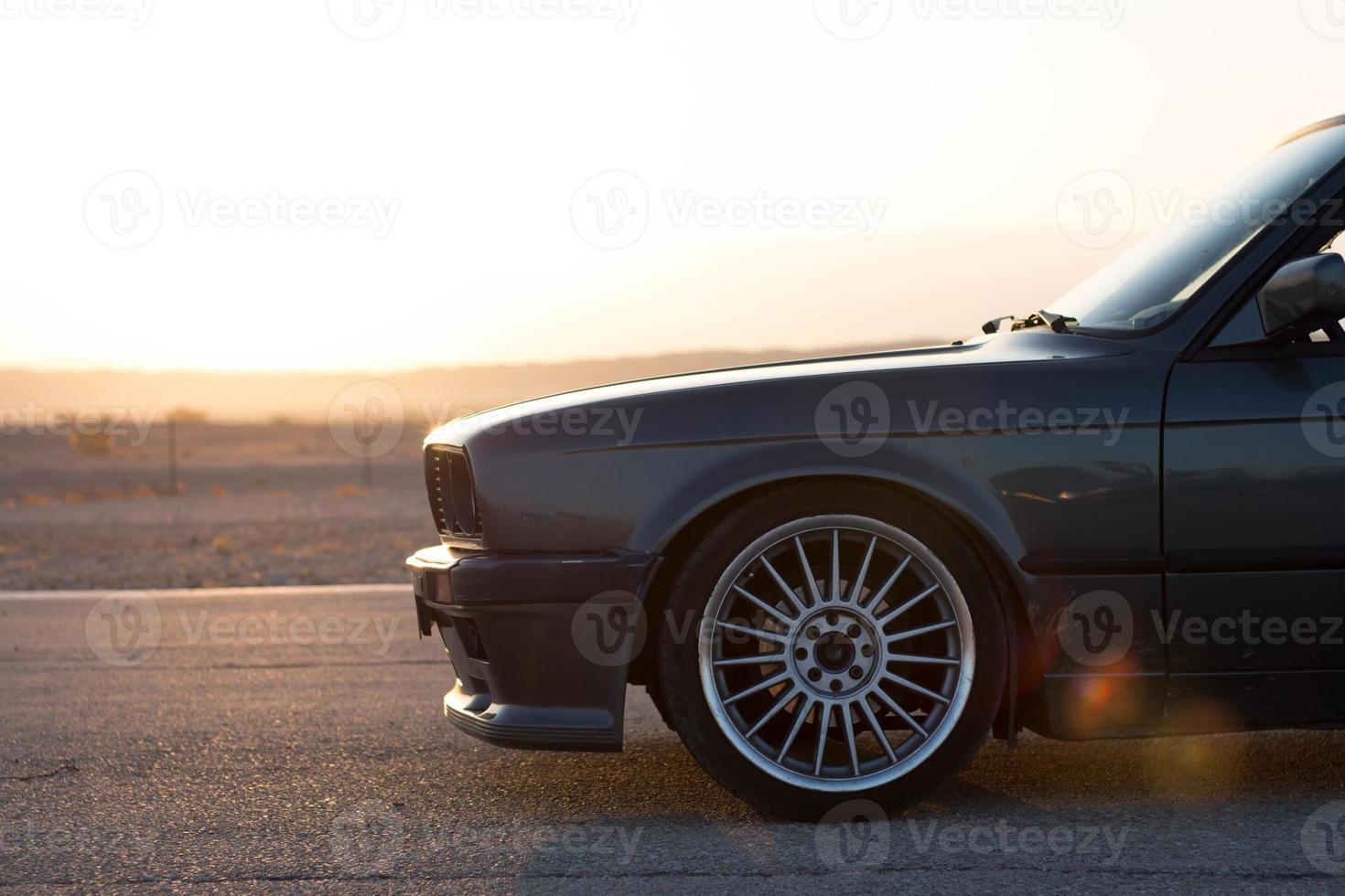 Cars on the race track and on the roads of the desert photo