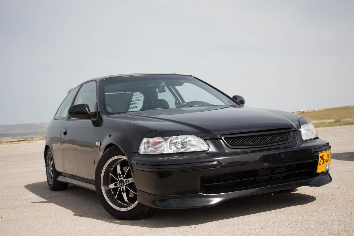 Cars on the race track and on the roads of the desert photo