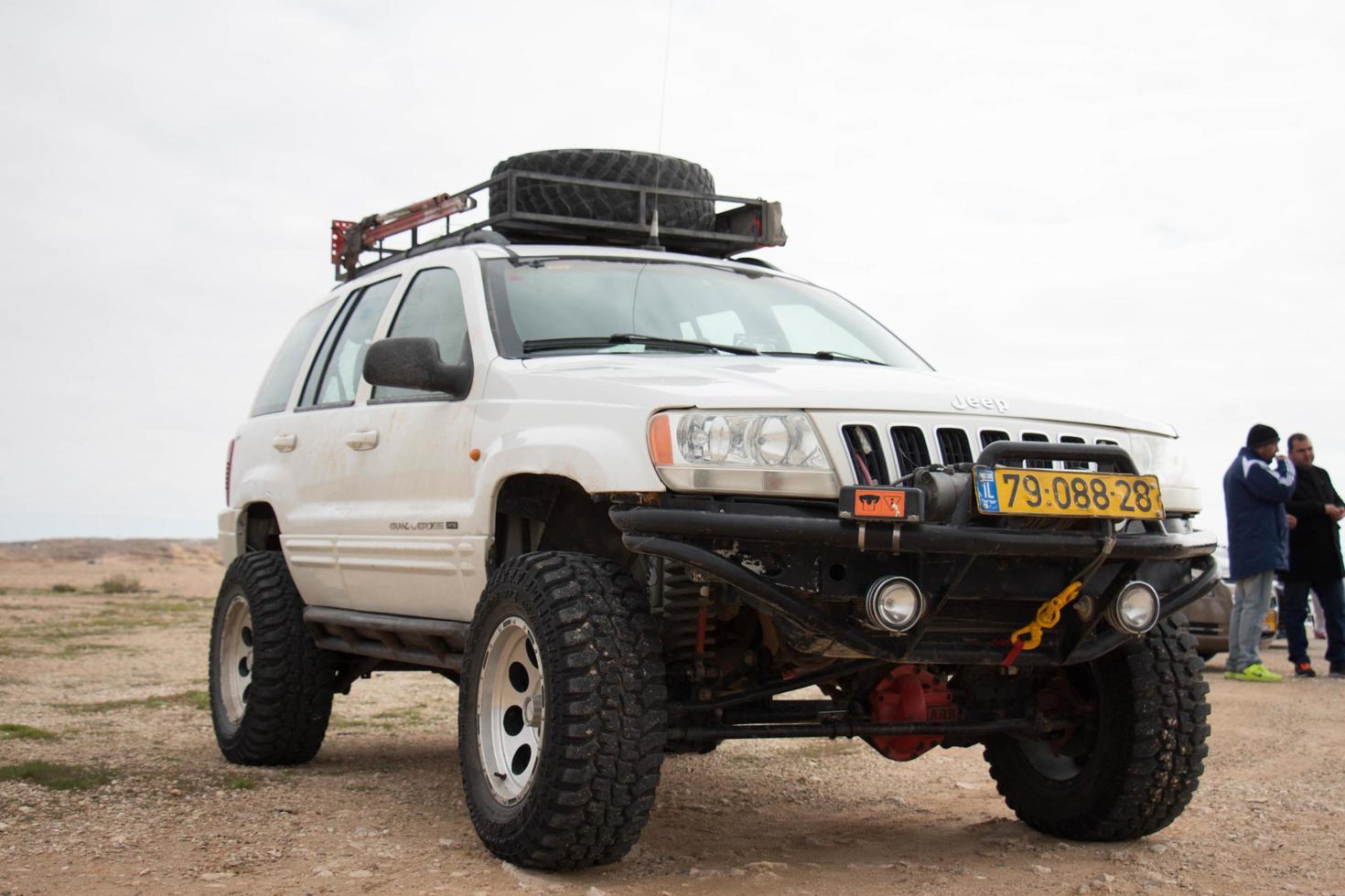 Cars on the race track and on the roads of the desert photo