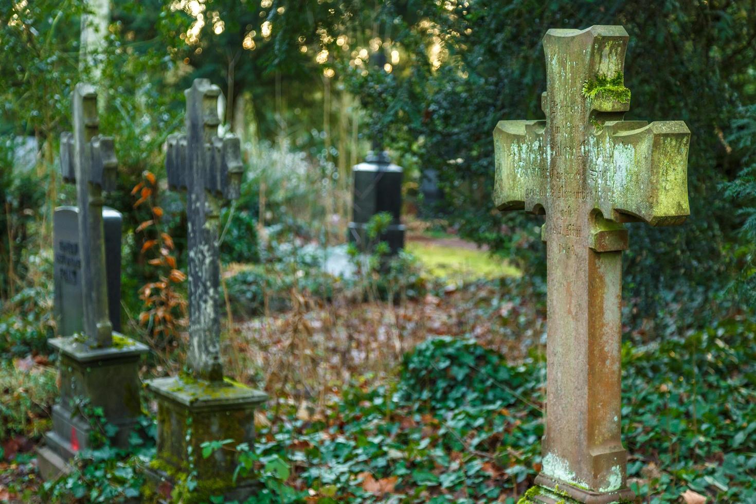 Cross Stone in Cemetery photo