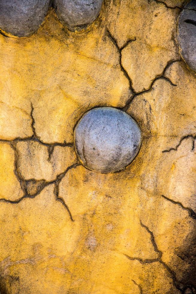 Resumen antiguo grunge superficie de la pared de piedra agrietada foto