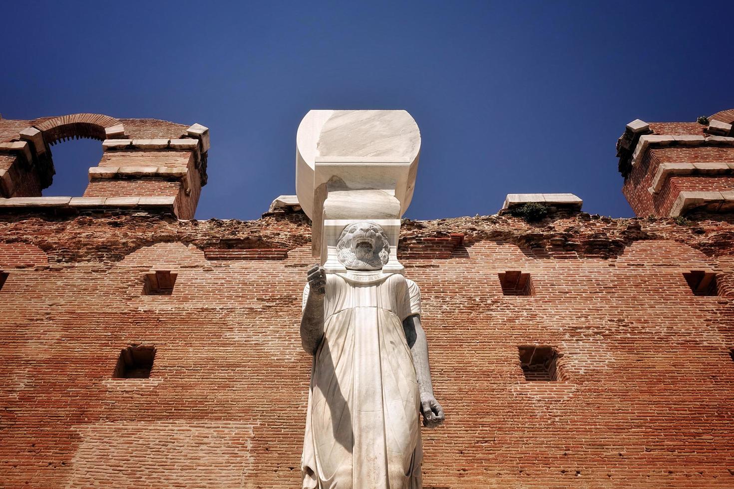 Egyptian Goddess Statue in Red Bazilica of Bergama in Turkey photo