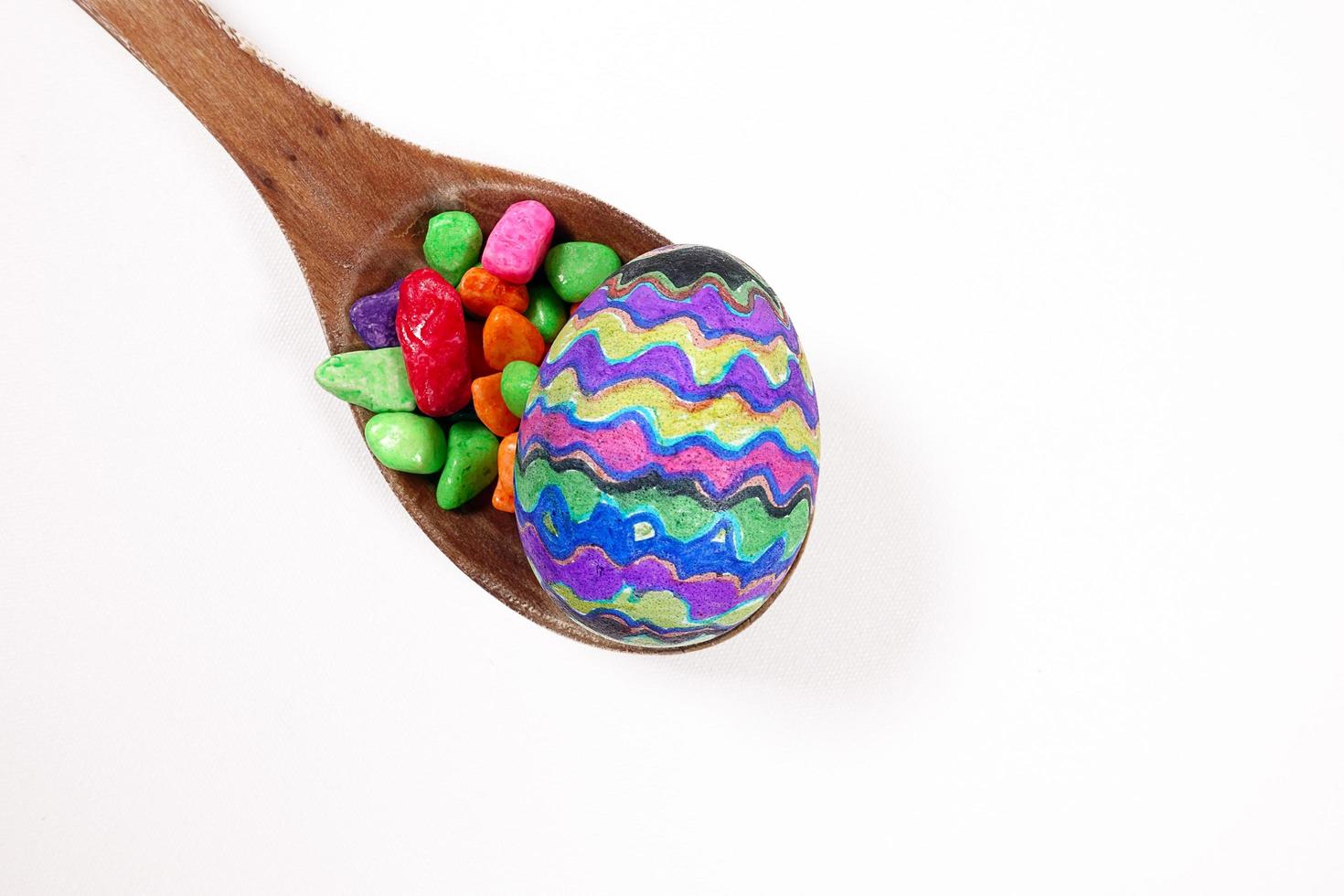 Colorful Paschal Easter Eggs and Wooden Spoon Celebration photo