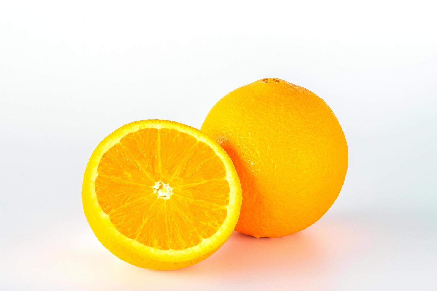 Orange fruit slice isolated on white background. photo