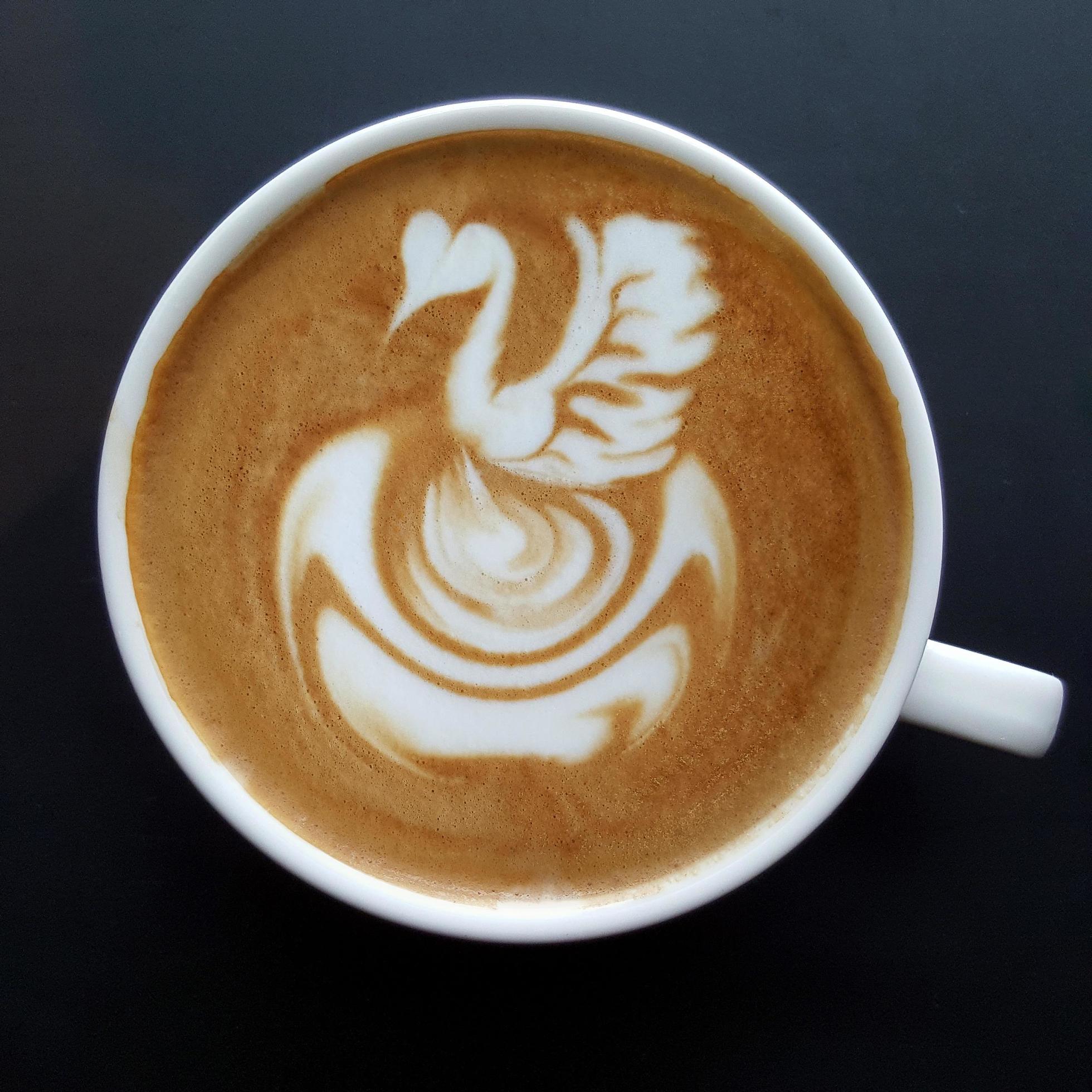 Top view of a mug of latte art coffee. 3201491 Stock Photo at Vecteezy