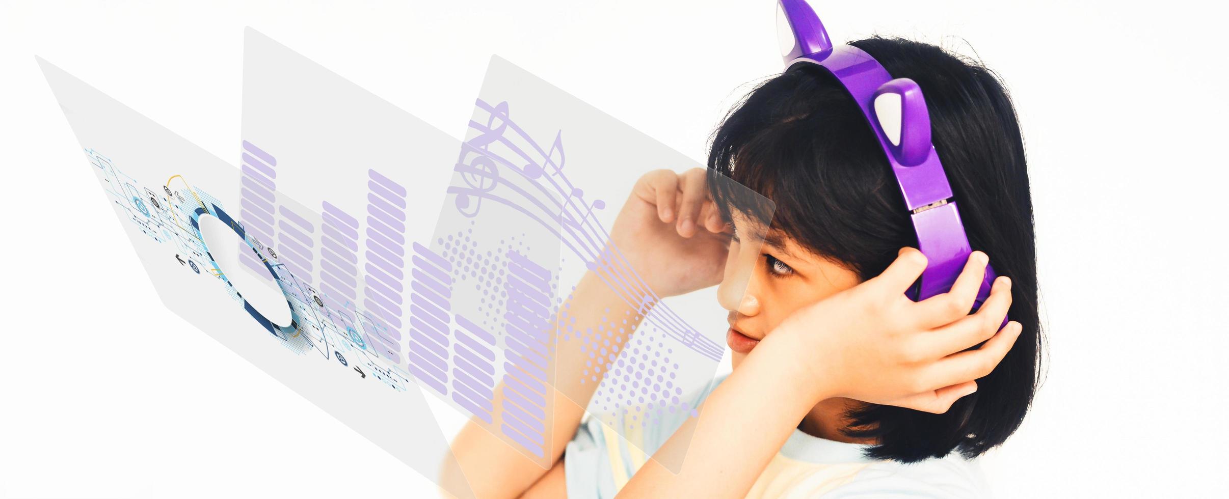 A young girl enjoying the digital music photo