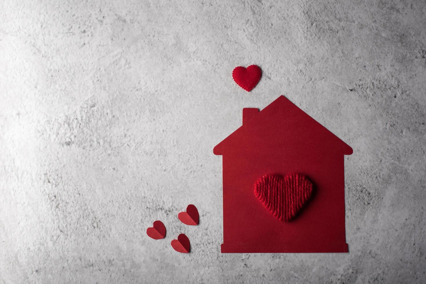 Paper house with heart flat design. photo