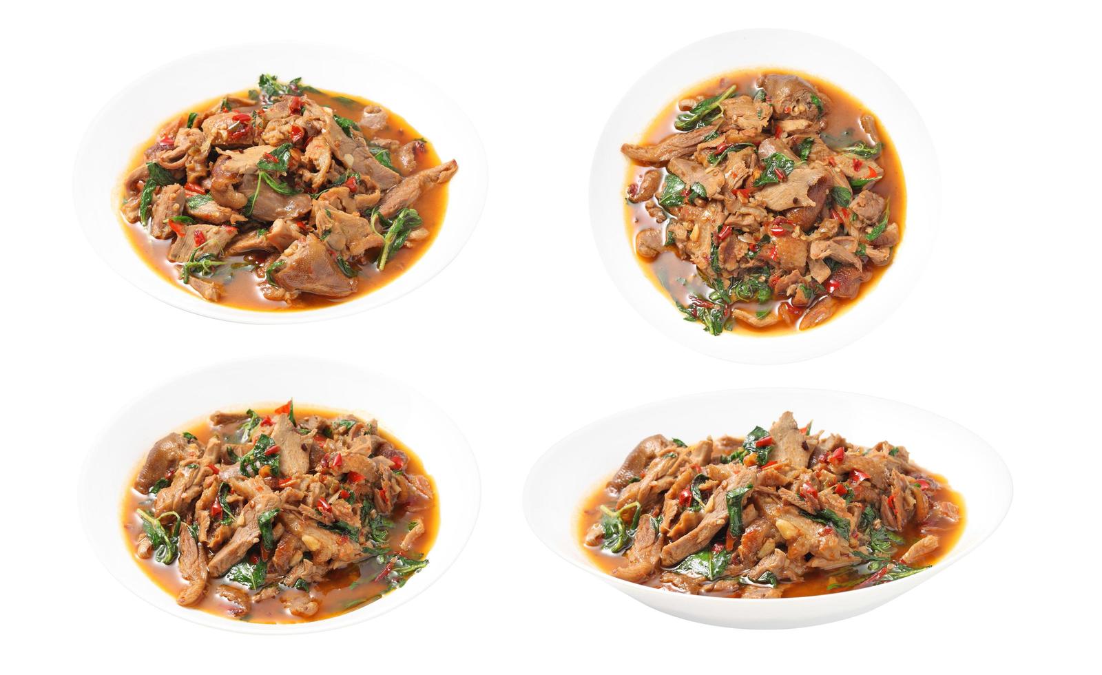 Thai spicy stir-fried duck and basil on white background photo