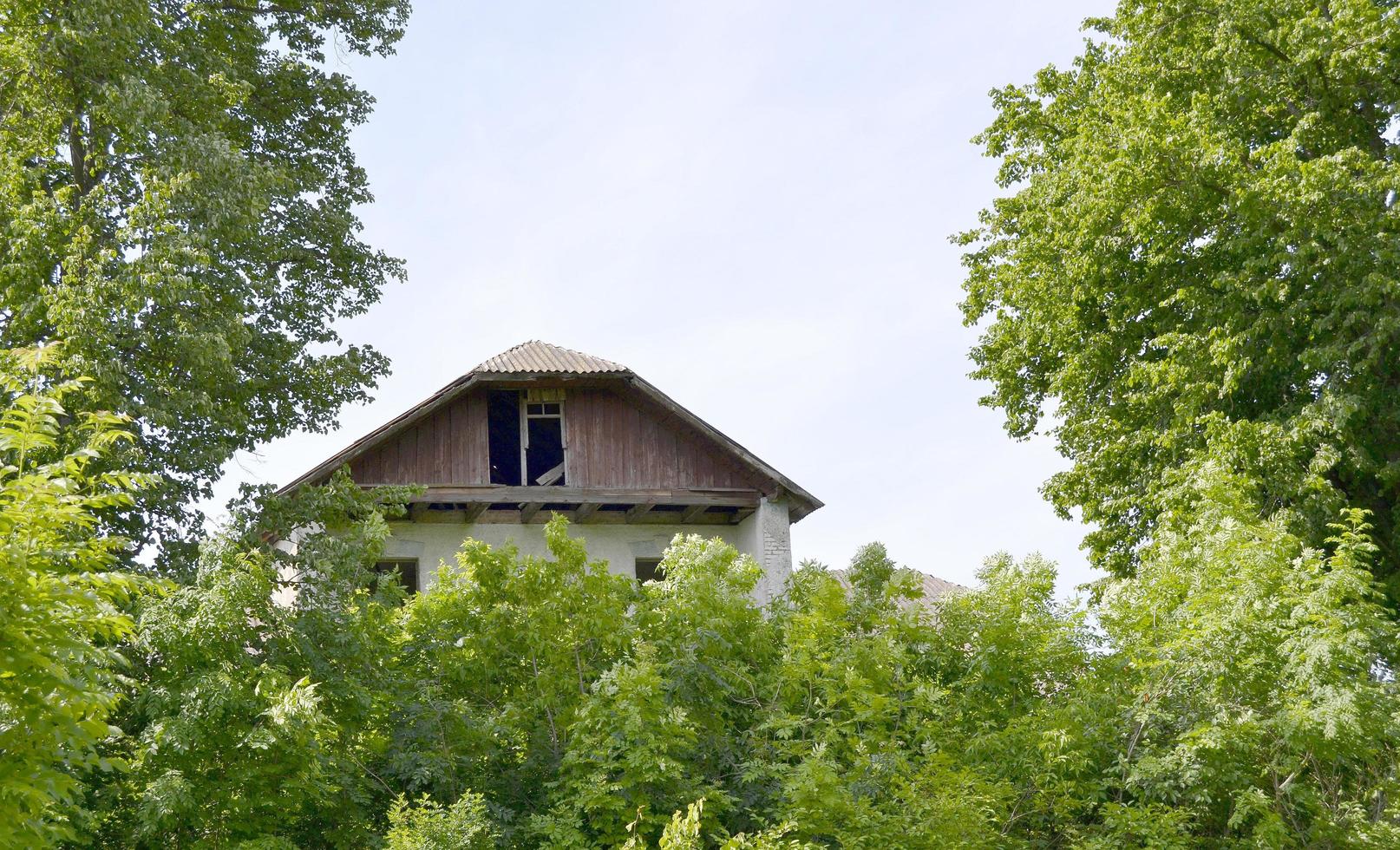 Beautiful old abandoned building farm house in countryside photo