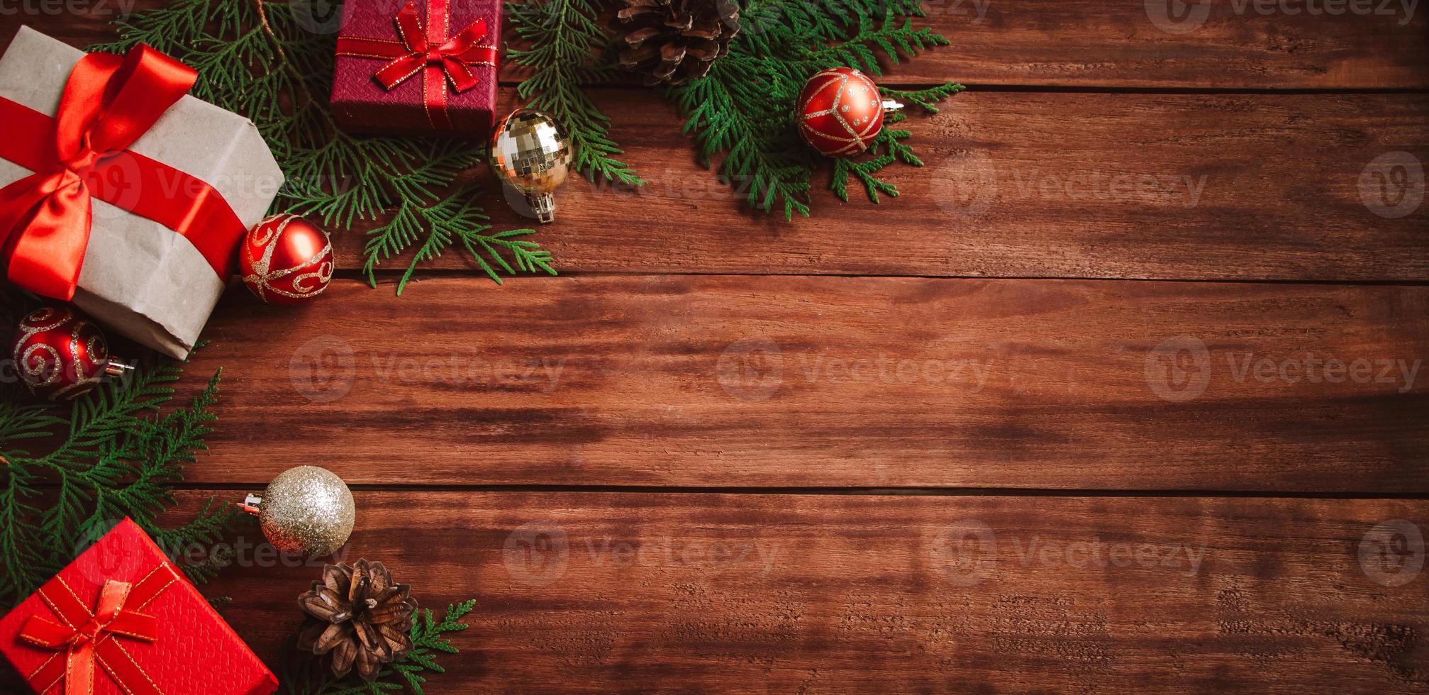 Christmas composition on wooden background. Gift boxes photo