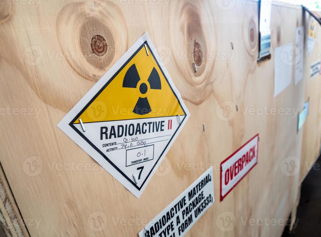 Radiation label beside the transport wooden box Type A package photo