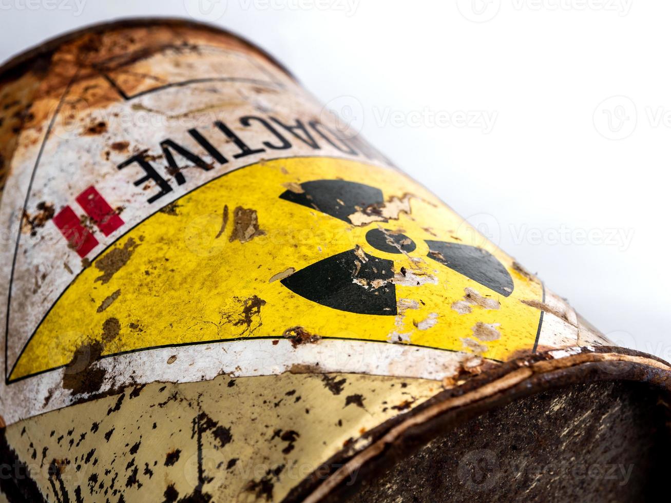 Radiation warning sign on the rusty radioactive material container photo