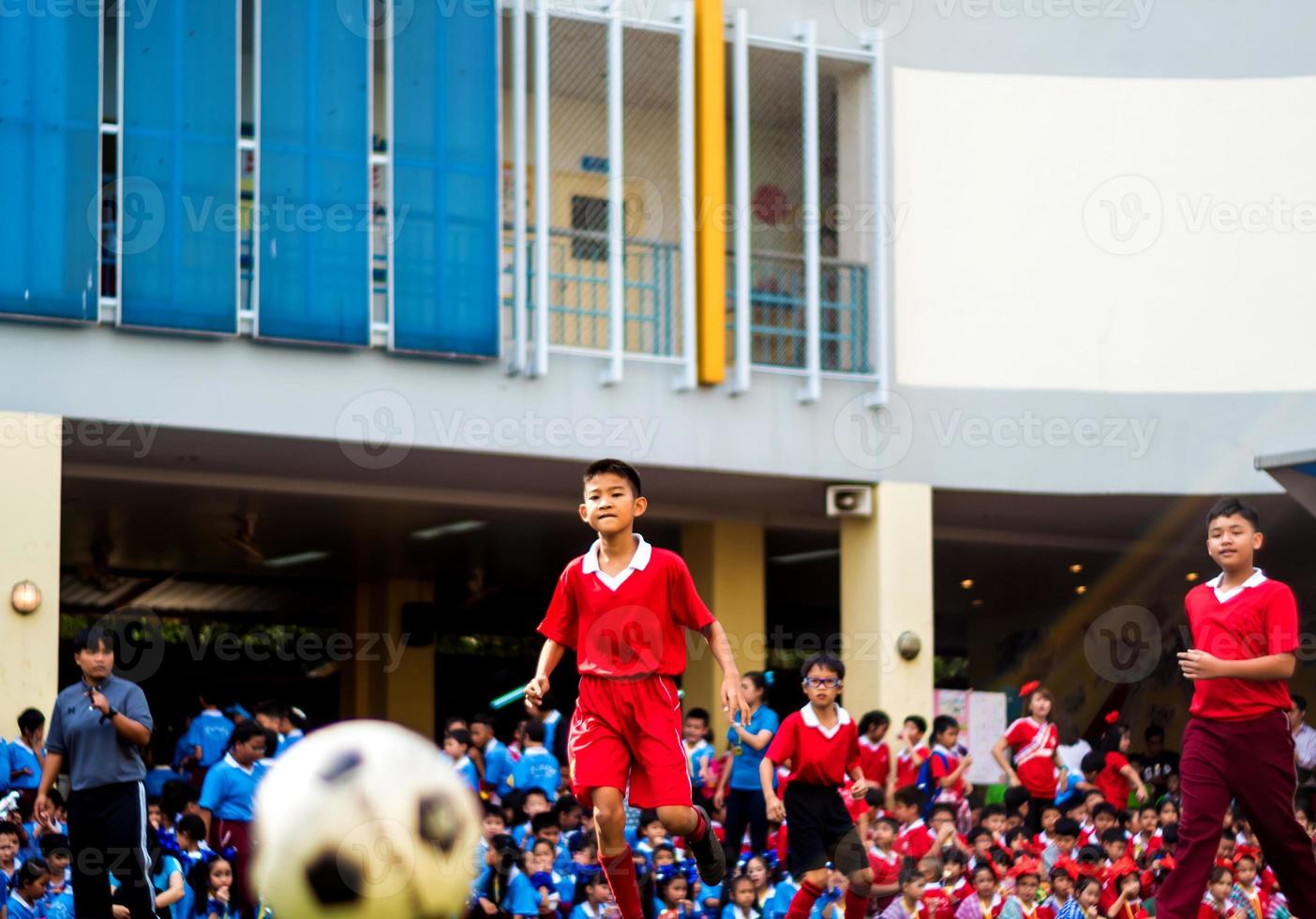 Amateur football players are competing in football sport photo