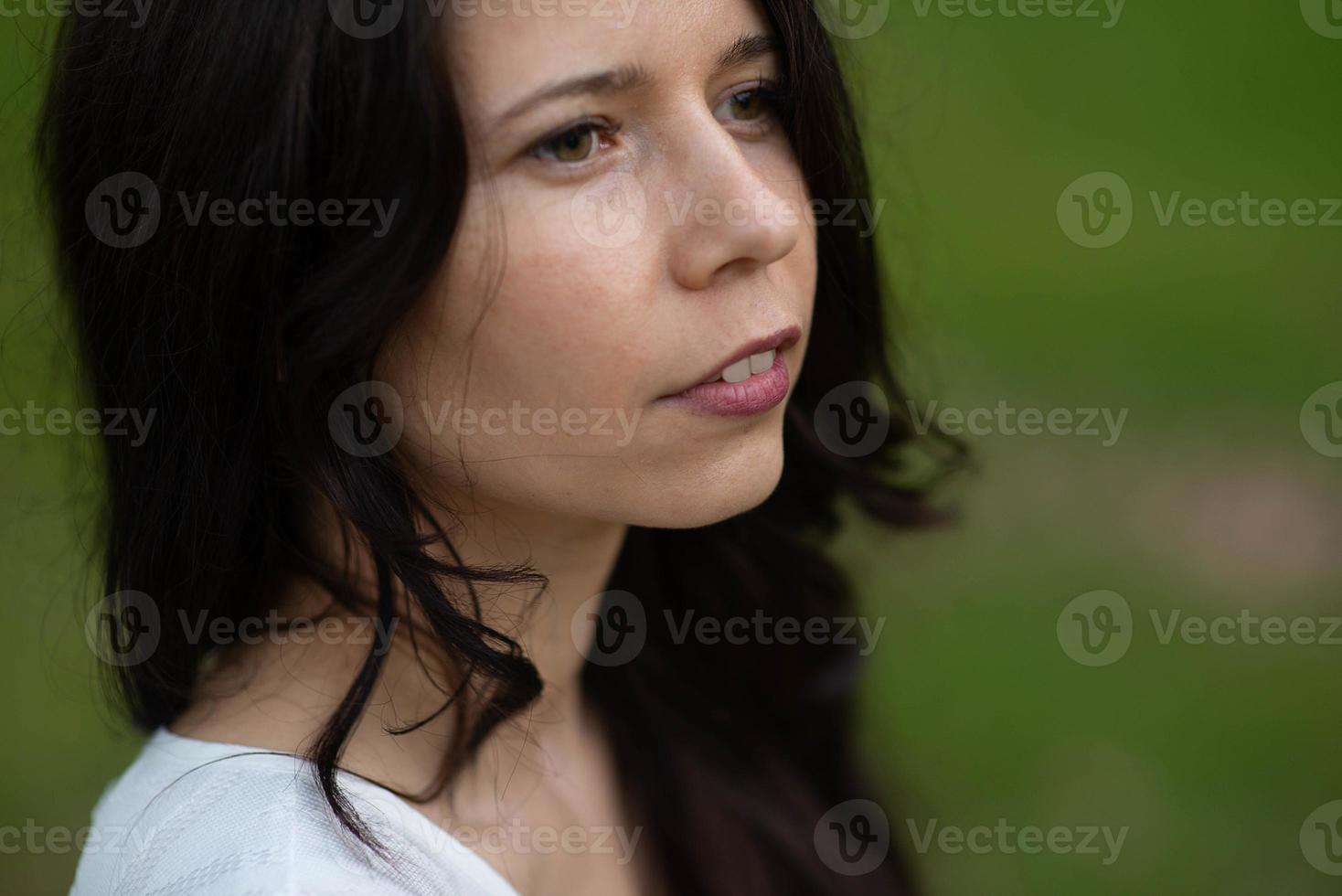 Close-up portrait of a sensual pretty young woman face photo