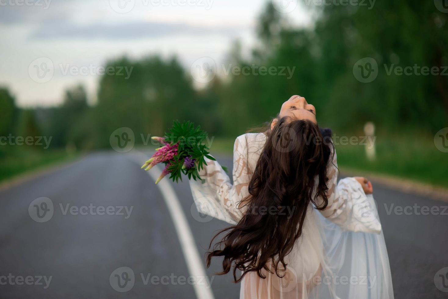 woman on empty road photo