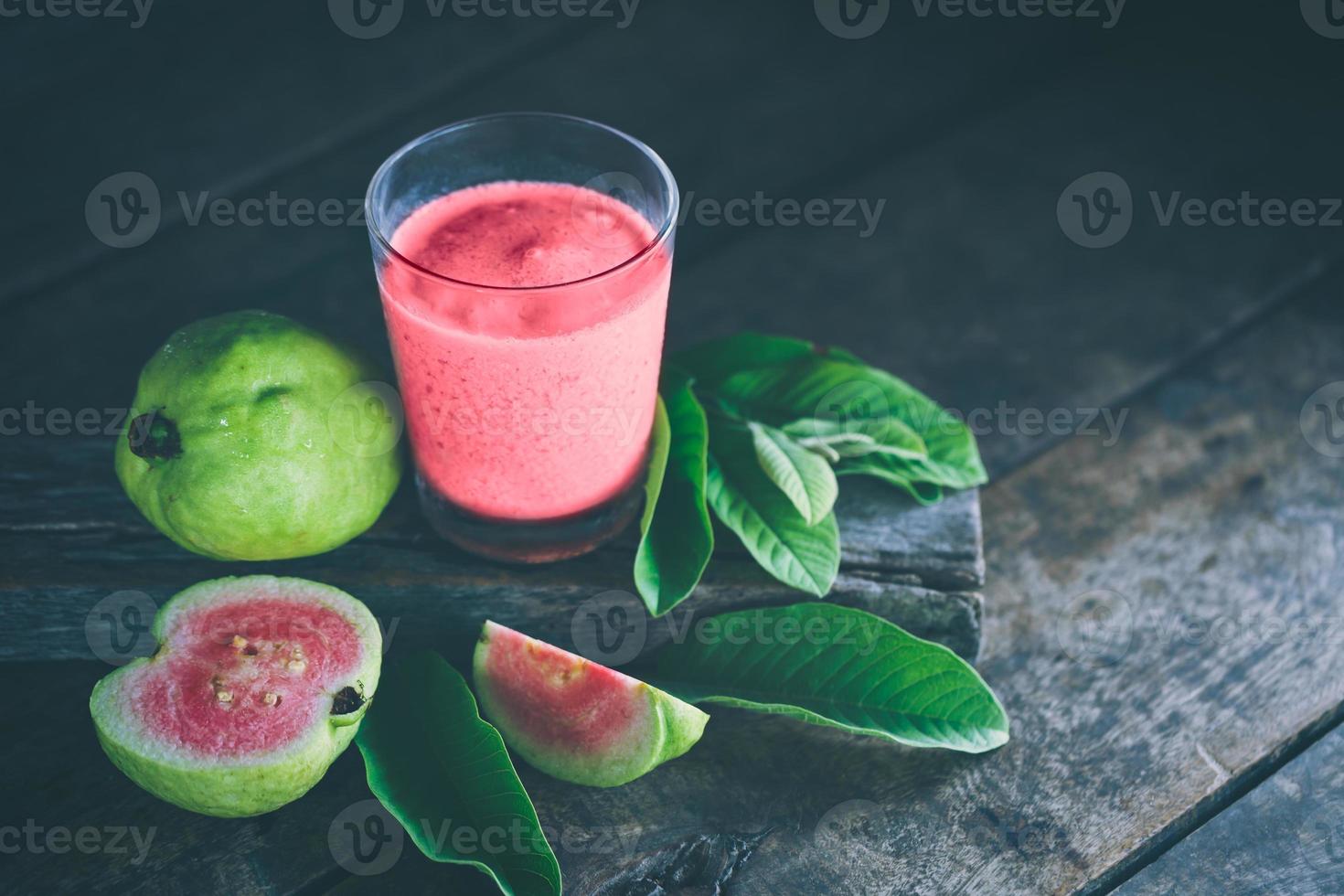 Guava juice on wood photo