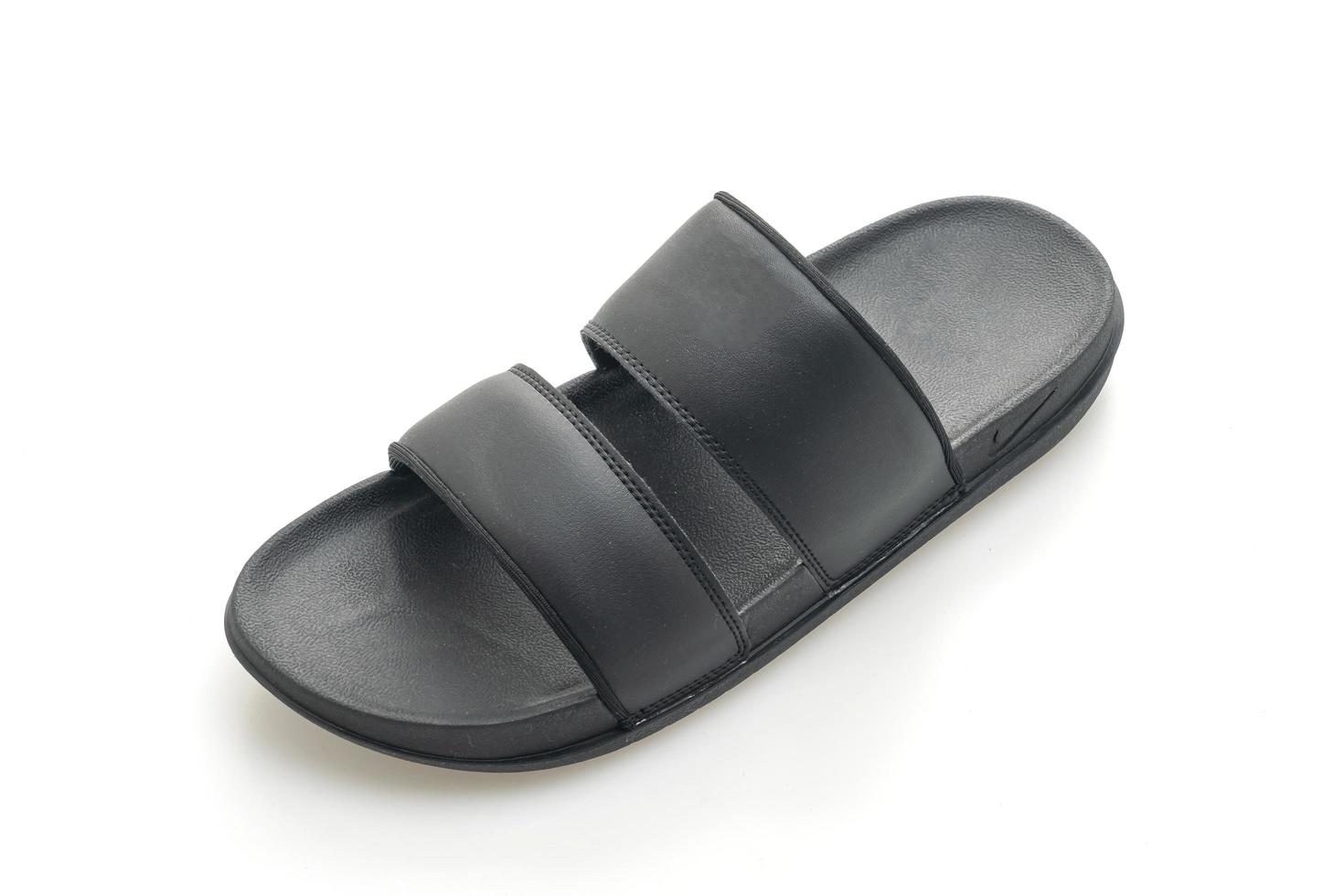 Black leather sandals isolated on white background photo