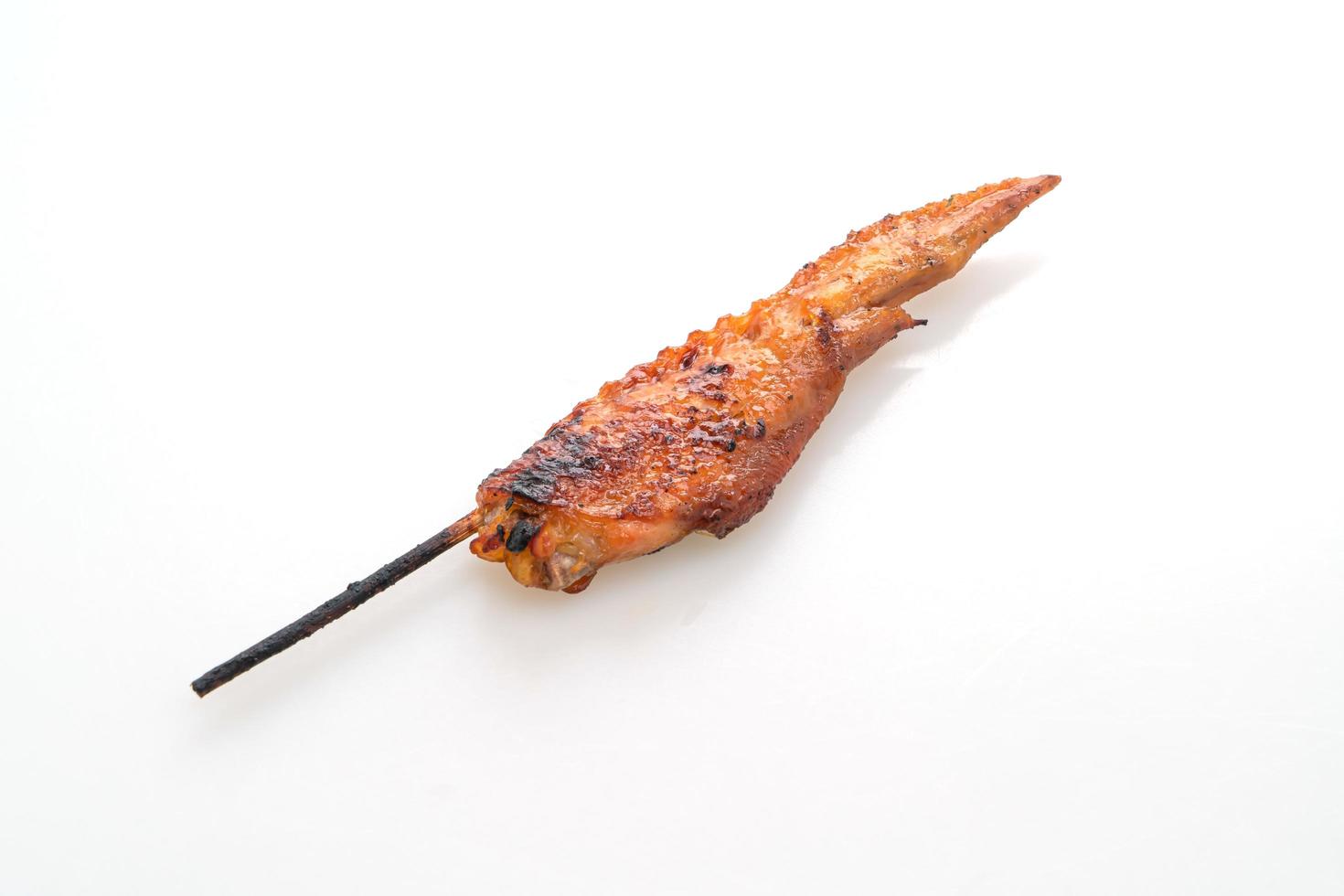 Grilled or barbecue chicken wings skewer with sticky rice photo