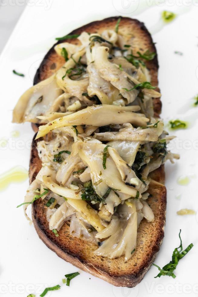 Garlic mushroom Portuguese traditional tiborna toast sandwich tapas snack food photo