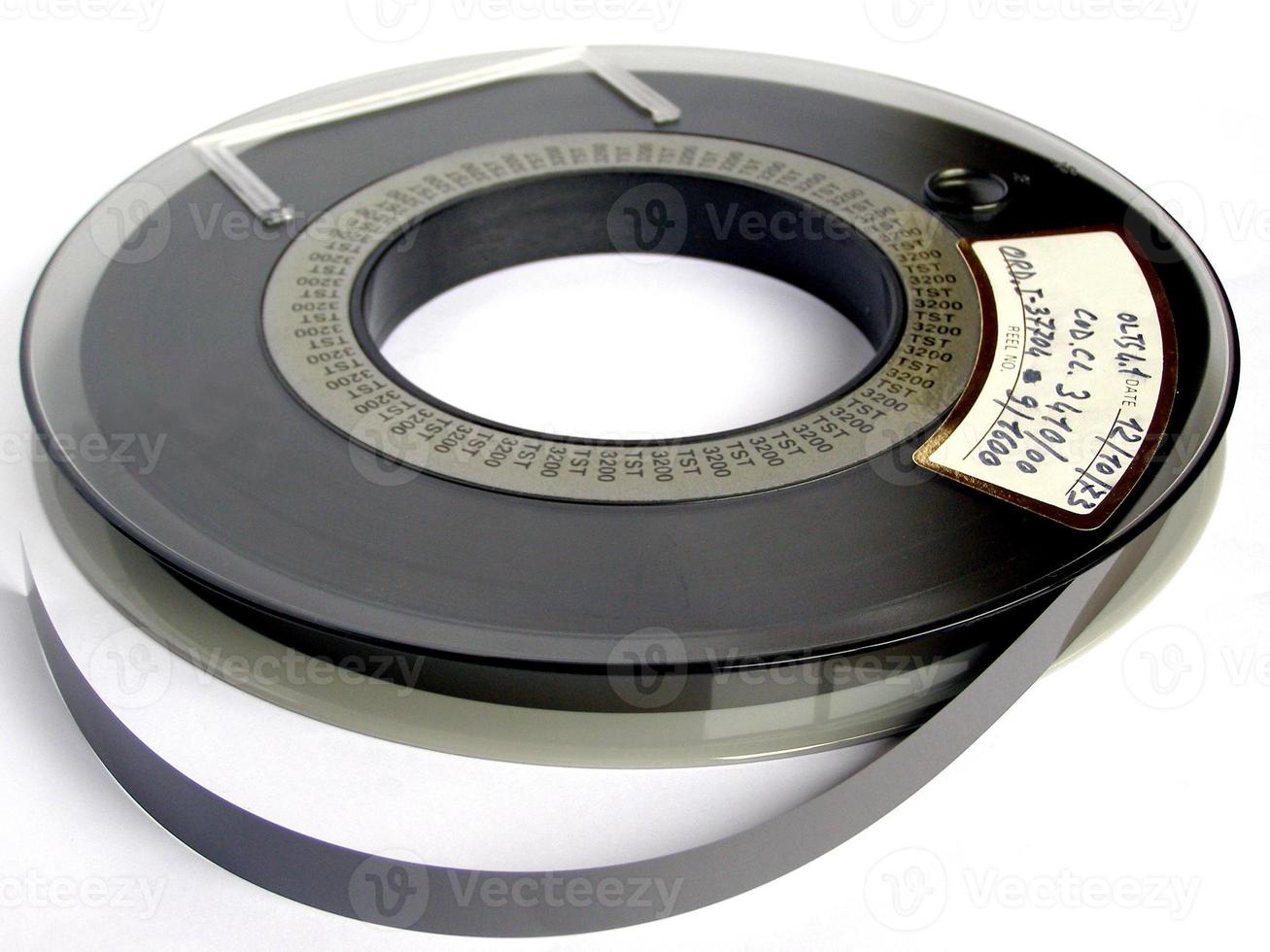 Tape reel over white photo