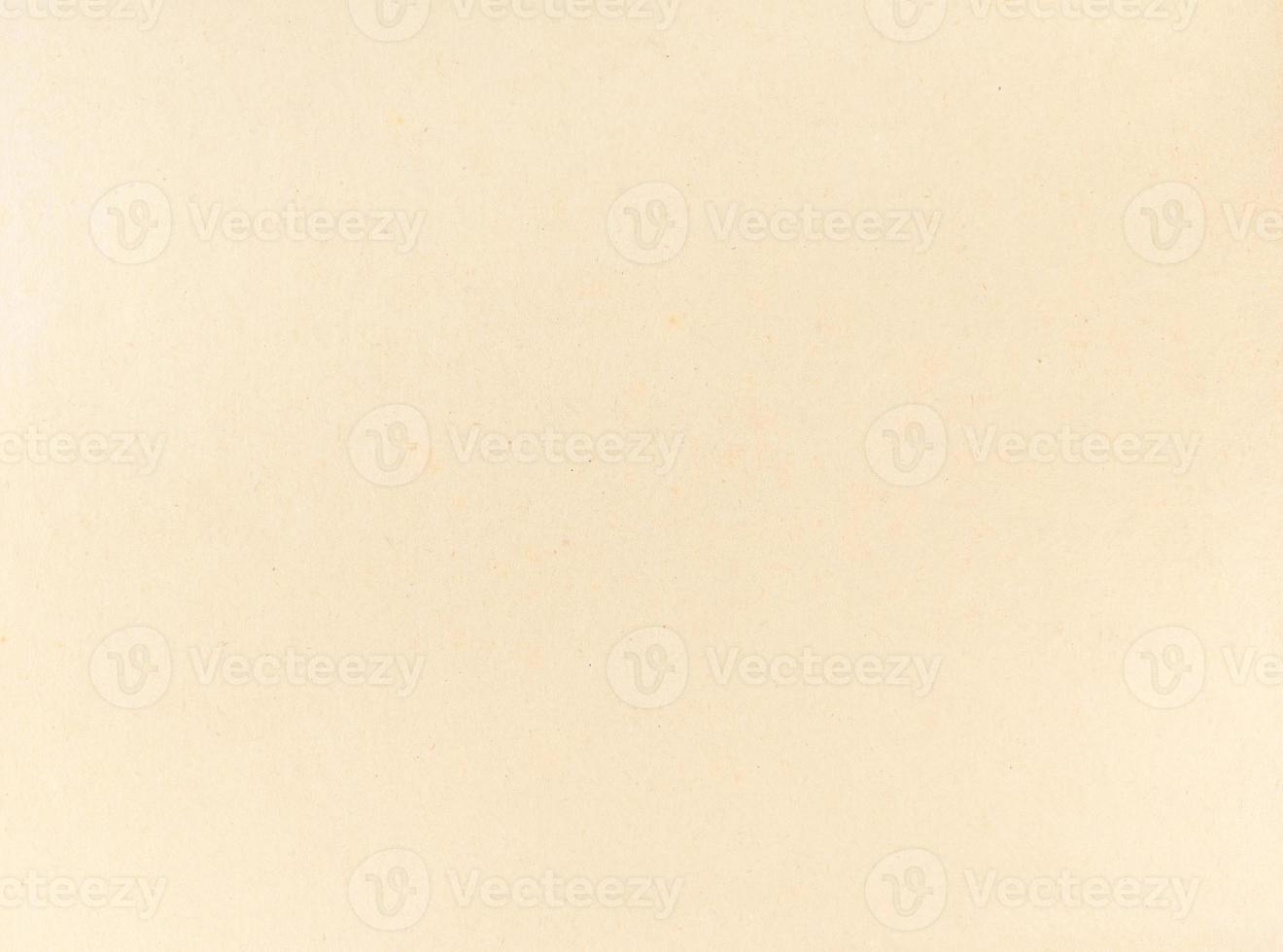 An old beige paper grunge texture background photo