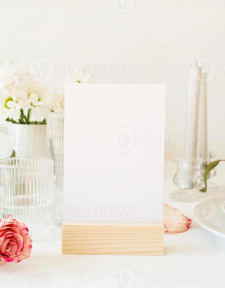 Mock up table tent, menu or stand for booklet on restaurant table photo