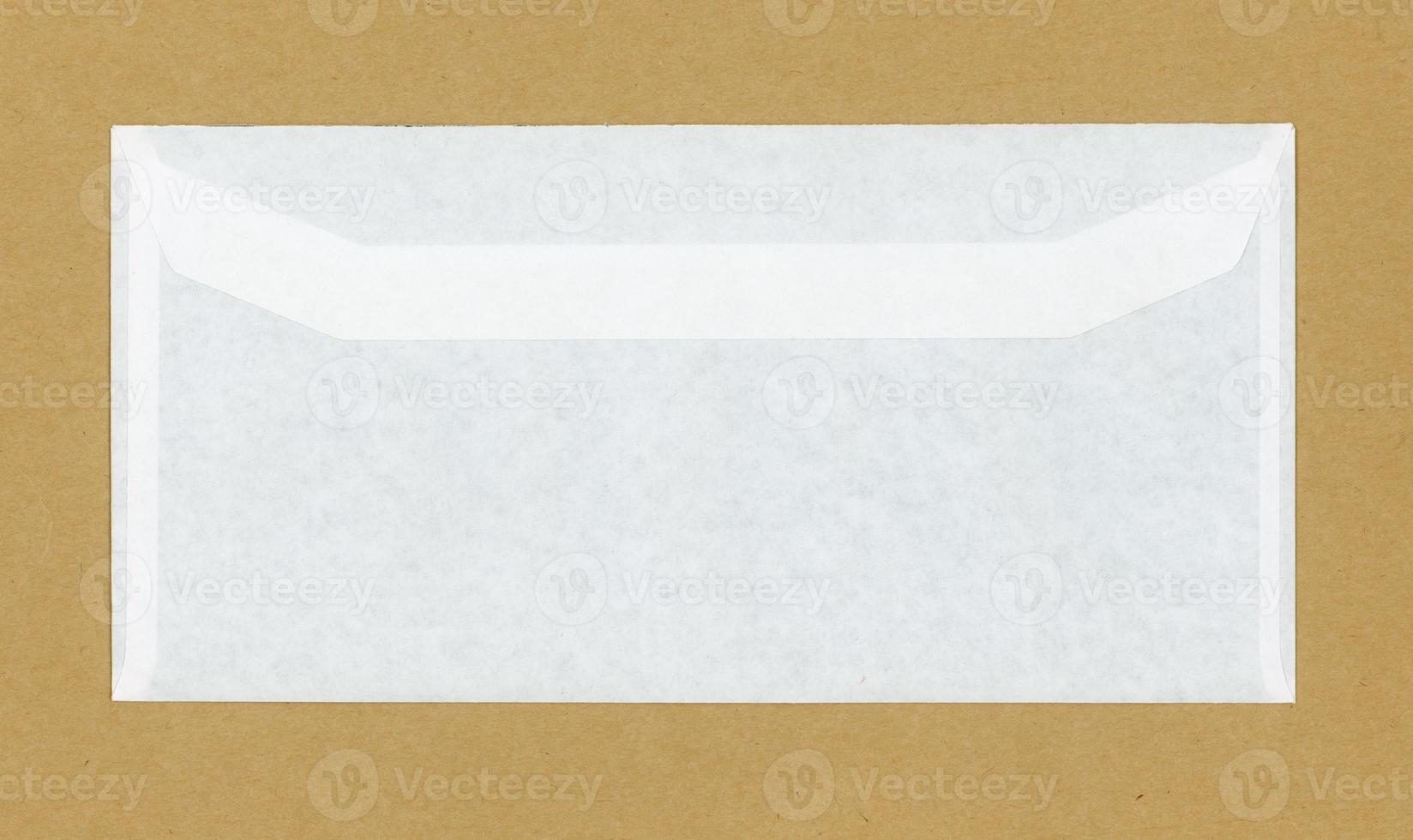 Letter envelope om brown background photo