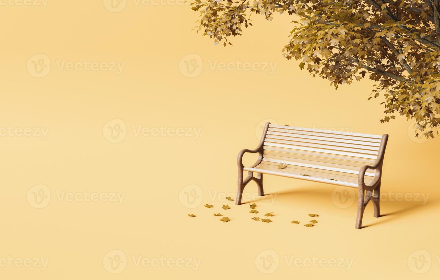 Minimalistic park bench under autumn tree with fallen leaves photo