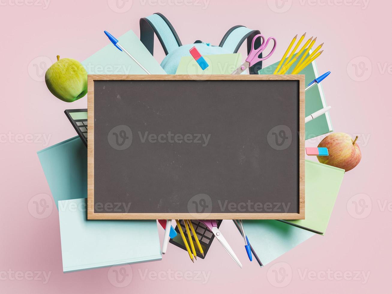 Empty blackboard with school supplies photo