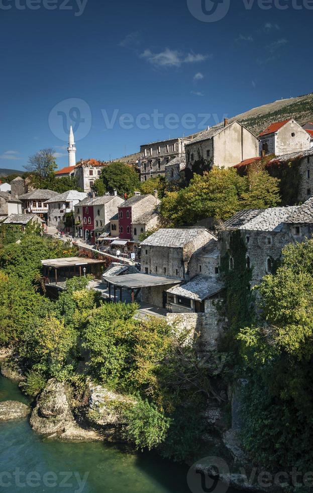 Neretva river and mosque in old town of Mostar Bosnia photo